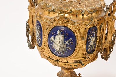 Lot 639 - 19th century French ormolu three piece clock set with inset enamelled panels depicting military figures