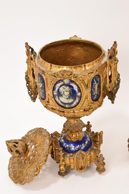 Lot 639 - 19th century French ormolu three piece clock set with inset enamelled panels depicting military figures