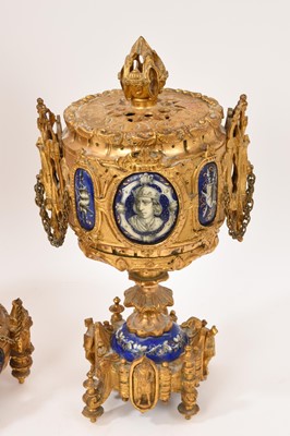 Lot 639 - 19th century French ormolu three piece clock set with inset enamelled panels depicting military figures