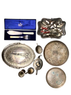 Lot 232 - Quantity of silver plate to include candle sticks, cream jug, mugs, set of mother of pearl handled butter knifes and other silver plated items