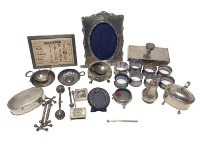 Lot 189 - Mixed group of silver pieces including napkin rings, blotter, desk calendar and other pieces