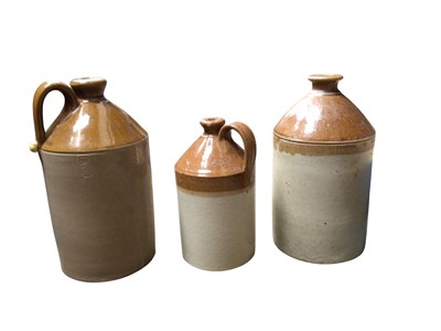 Lot 247 - Eleven stoneware pots in various sizes one inscribed with Daniell & Sons, West Bergholt