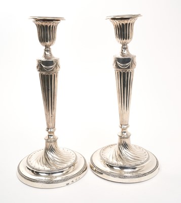 Lot 387 - Pair of George III silver candlesticks