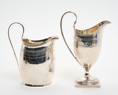 Lot 391 - Two Georgian silver cream jugs