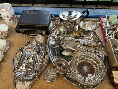 Lot 49 - Mixed 19th century and later silver plate to include a two handled plated tray, pair of wine coasters, cutlery and other items