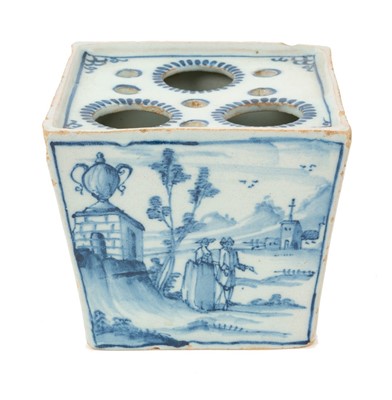 Lot 8 - 18th / 19th century blue and white delftware flower vase, of square tapering form, painted with figures in a landscape, 9.25cm high