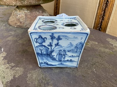 Lot 8 - 18th / 19th century blue and white delftware flower vase, of square tapering form, painted with figures in a landscape, 9.25cm high