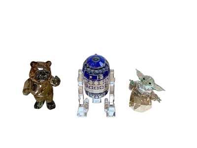 Lot 692 - Three Swarovski Crystal Star Wars figures - R2D2, Wicket and Baby Yoda The Child (all boxed)