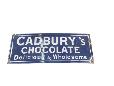Lot 515 - Reproduction Cadbury's Chocolate enamel advertising sign, 50.5cm in length.