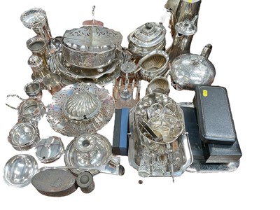 Lot 522 - Group of assorted silver plated wares to include three piece teaset, spill vases and other items.