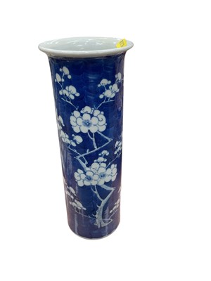 Lot 540 - Late 19th century Chinese porcelain vase of cylindrical form, with prunus decoration on crushed ice ground, character marks to base, 25.5cm in height.