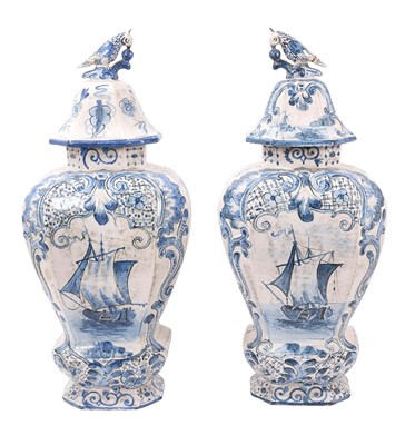Lot 85 - Large pair of Dutch Delft blue and white vases and covers