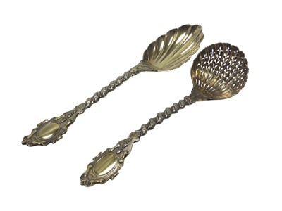 Lot 215 - Victorian silver gilt sifter spoon and matching serving spoon