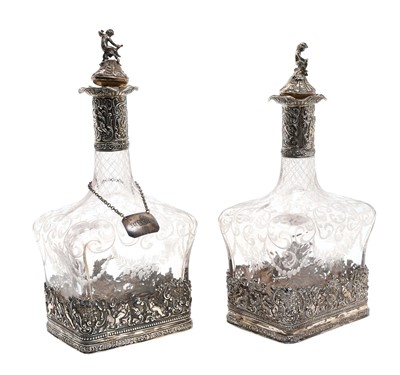Lot 166 - Pair of 19th century Continental silver mounted decanters