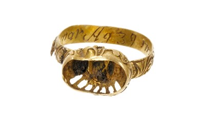 Lot 404 - Rare early 18th century gold memento mori ring, dated 1712