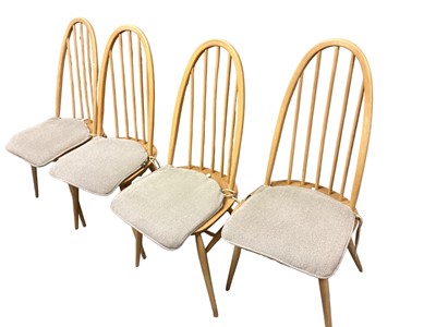 Lot 1411 - Set of four Ercol stick back chairs