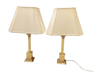 Lot 365 - Pair of brass corinthian column table lamps with shades
