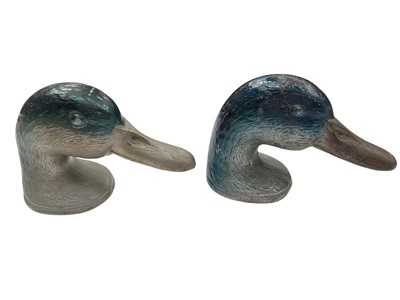 Lot 367 - Two Kirby, Beard & Co. 'Ducky' bottle openers in the form of a mallard's head