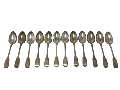 Lot 175 - Set of twelve George IV silver Fiddle pattern tablespoons with engraved armorial crests