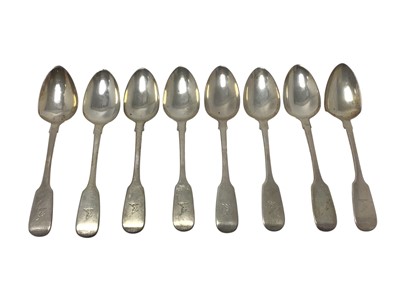 Lot 177 - Set of eight George IV silver dessert spoons with engraved armorial crests (London 1827)