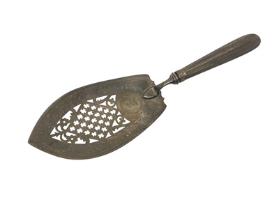 Lot 179 - George III silver fish slice with pierced blade with engraved armorial crest and reeded handle