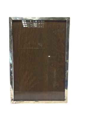 Lot 196 - Large George V silver photograph frame of rectangular form, with oak backing