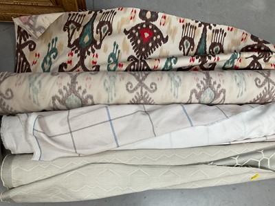 Lot 390 - Three rolls of fabric, together with several other cuts of fabric and a collection of patterns