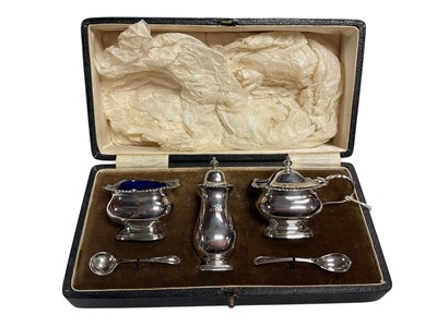 Lot 48 - Silver three piece condiment set (Birmingham 1932), maker Walker & Hall, in fitted case