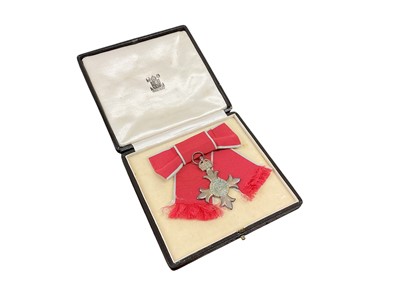 Lot 723 - The Most Excellent Order of the British Empire Members (M.B.E.) breast badge, ladies' type in box of issue.