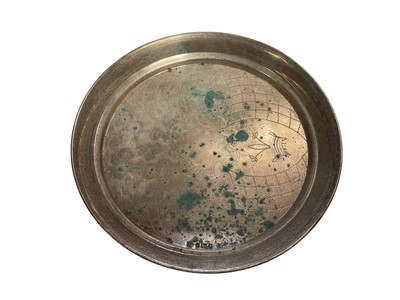 Lot 62 - Silver circular dish with engraved decoration on three bun feet, 20cm diamater (London hallmarks)