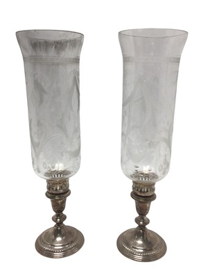 Lot 199 - Pair contemporary silver candlesticks, with inverted bell shaped stems, on circular weighted bases