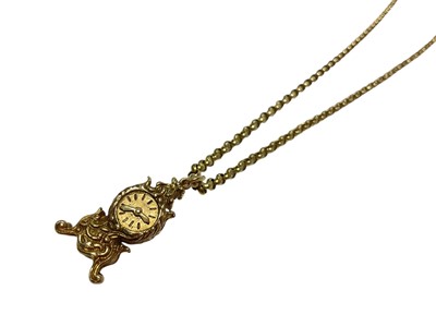 Lot 120 - 9ct gold novelty charm in the form of an antique clock, on yellow metal belcher link chain