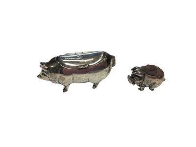 Lot 89 - Victorian silver pill box in the form of a pig, together with a miniature silver pig pin cushion
