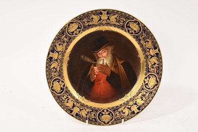 Lot 3 - Vienna plate, finely painted with a man smoking, signed Wagner