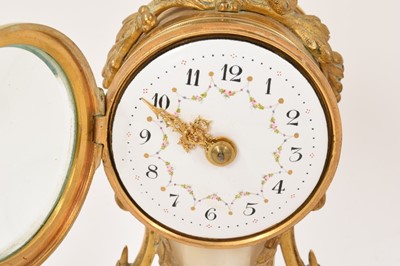 Lot 638 - Late 19th century French small clock garniture