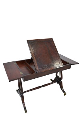 Lot 1399 - Regency rosewood and mahogany library table with hinged tooled red leather lined top, on lyre shape end standards