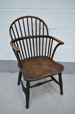 Lot 1393 - Early 19th century ash and elm Windsor elbow chair