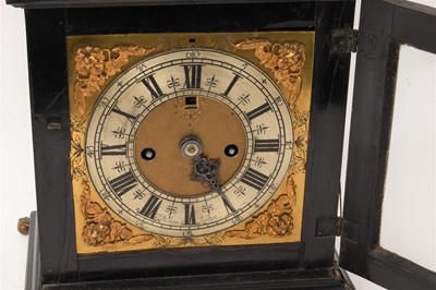Lot 642 - Georgian bracket clock by R Williams, London with engraved back plate together with pierced brass caddy top. Pendulum and two winding keys present