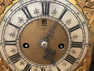 Lot 642 - Georgian bracket clock by R Williams, London with engraved back plate together with pierced brass caddy top. Pendulum and two winding keys present