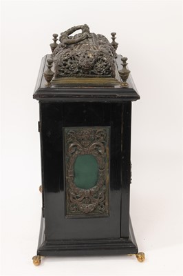 Lot 642 - Georgian bracket clock by R Williams, London with engraved back plate together with pierced brass caddy top. Pendulum and two winding keys present