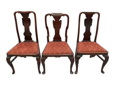 Lot 1428 - Pair of early 18th century carved walnut side chairs, and another similar