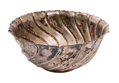 Lot 243 - Large late Victorian Irish silver bowl, with wrythen decoration and flared rim, on a circular base