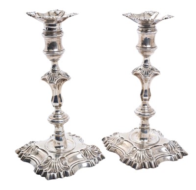 Lot 245 - Pair George II cast silver candlesticks, with knopped stems and cotton reel candle holders