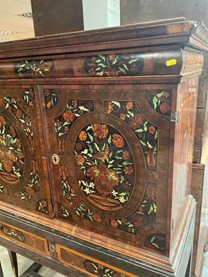 Lot 1432 - Good William & Mary walnut oyster veneered, specimen wood and green stained ivory marquetry inlaid cabinet on later stand, with cushion frieze drawer and fitted interior of drawers about centr...