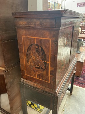 Lot 1432 - Good William & Mary walnut oyster veneered, specimen wood and green stained ivory marquetry inlaid cabinet on later stand, with cushion frieze drawer and fitted interior of drawers about centr...