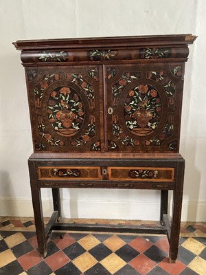 Lot 1432 - Good William & Mary walnut oyster veneered, specimen wood and green stained ivory marquetry inlaid cabinet on later stand, with cushion frieze drawer and fitted interior of drawers about centr...