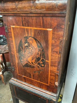 Lot 1432 - Good William & Mary walnut oyster veneered, specimen wood and green stained ivory marquetry inlaid cabinet on later stand, with cushion frieze drawer and fitted interior of drawers about centr...