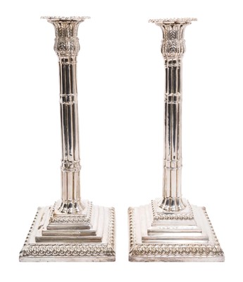 Lot 249 - Pair George III silver candlesticks, with tall cluster columns and leaf decorated candle holders