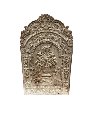 Lot 1444 - Antique cast iron fire back of small size, arched and moulded with flowers, approximately 54 x 37cm