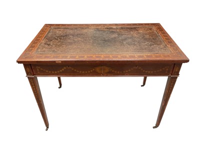 Lot 1445 - Early 20th century Sheraton revival mahogany and marquetry inlaid writing desk, with leather inset top and two flush frieze drawers to the harebell and patera inlaid frieze, on square tapered le...